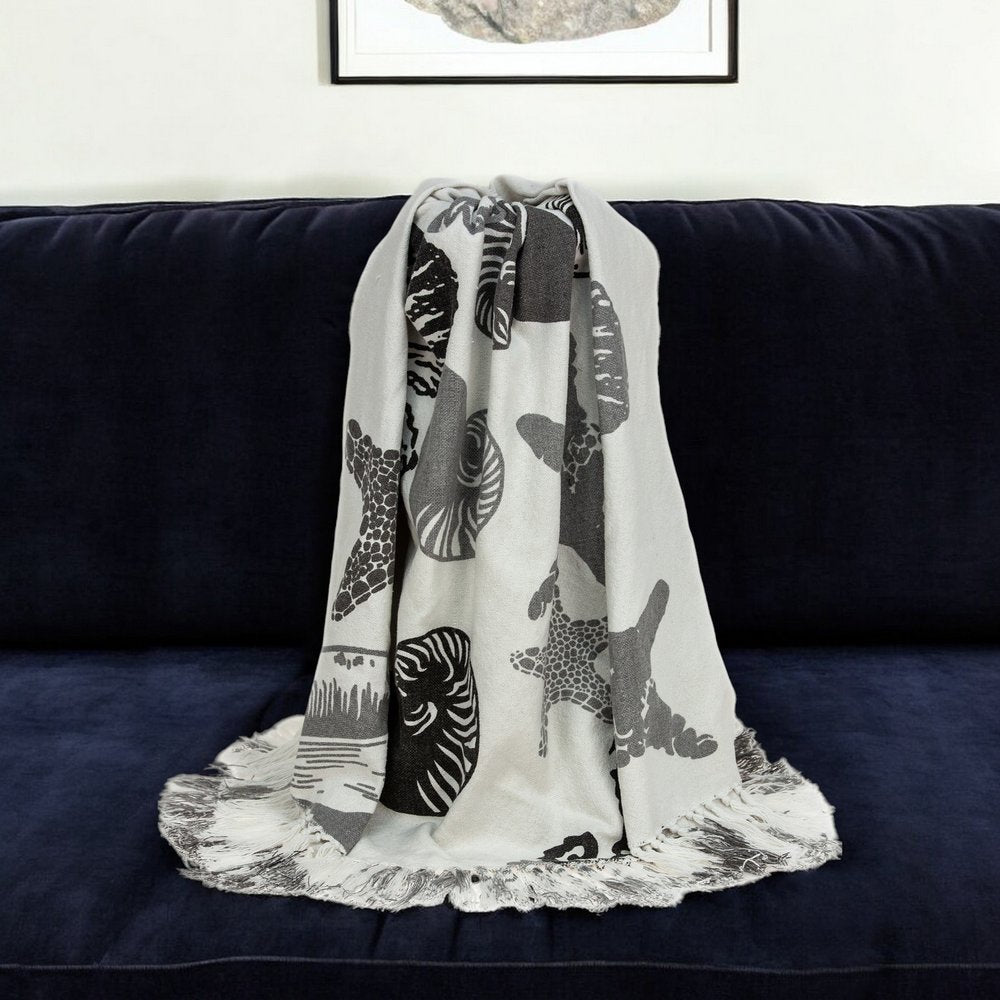 52" X 67" Ivory and Gray Woven Cotton Coastal Seashell Throw Blanket with Fringe HomeRoots