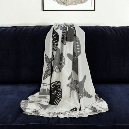 52" X 67" Ivory and Gray Woven Cotton Coastal Seashell Throw Blanket with Fringe HomeRoots