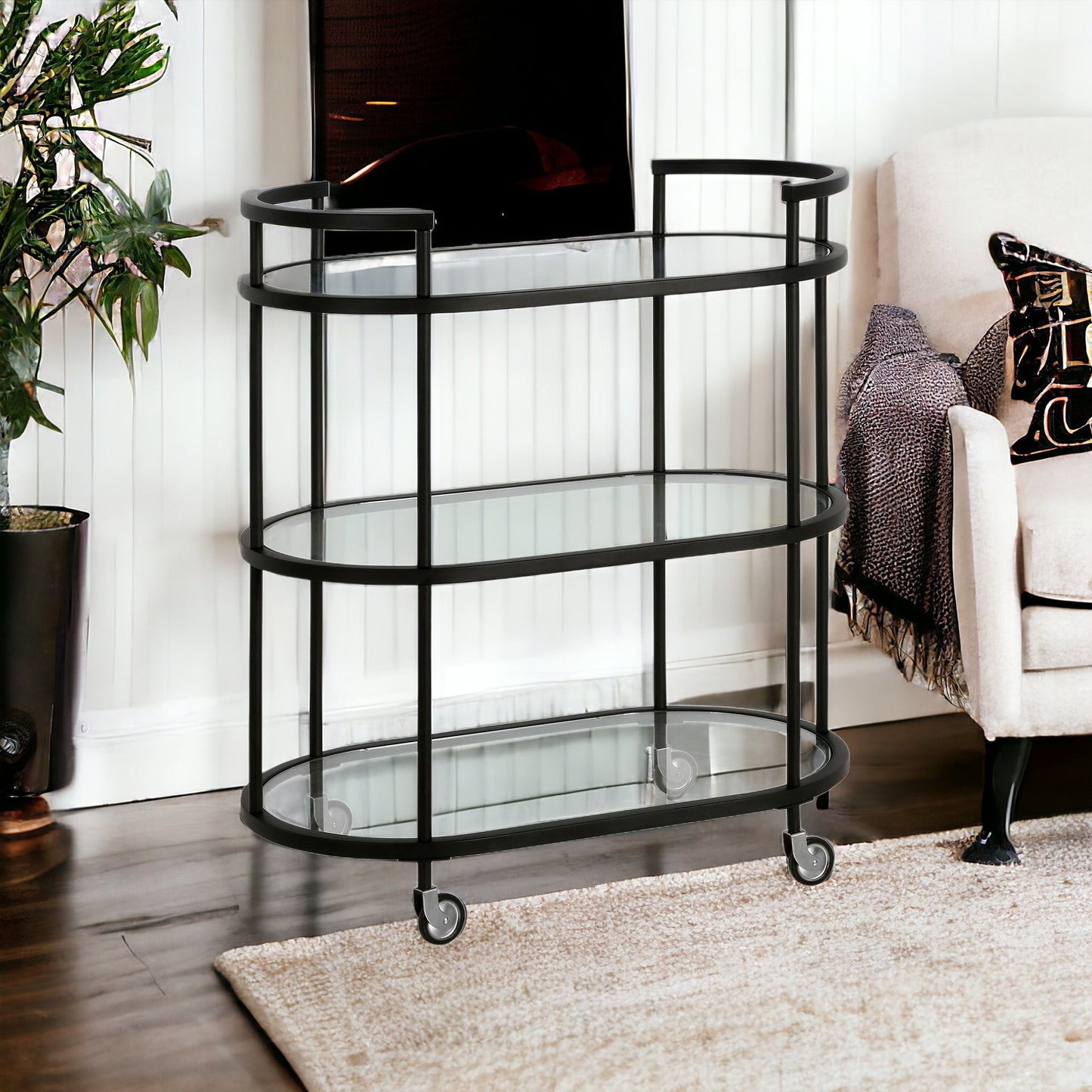 Black Steel And Glass Oval Rolling Bar Cart