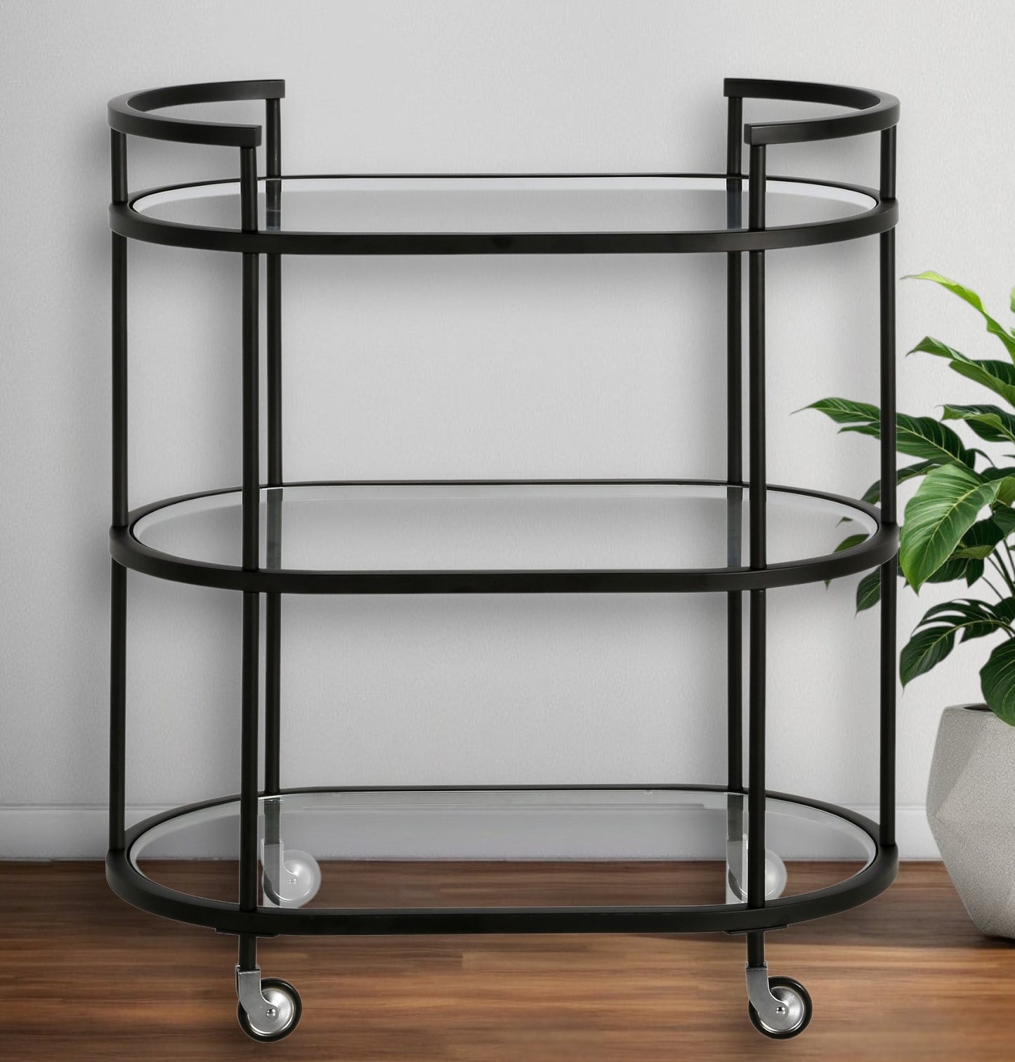 Black Steel And Glass Oval Rolling Bar Cart