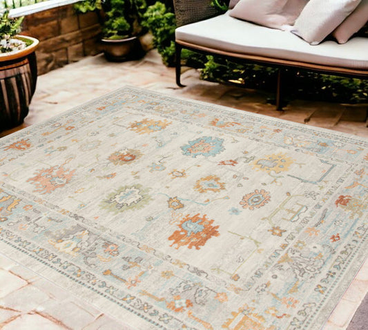 8' X 10' Blue and Orange Floral Stain Resistant Indoor Outdoor Area Rug - 0" (L) x 117" (W) x 93" (H)