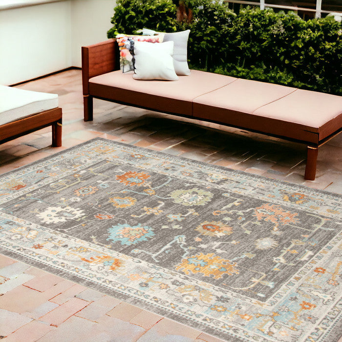 5' x 7' Blue and Orange Floral Stain Resistant Indoor Outdoor Area Rug