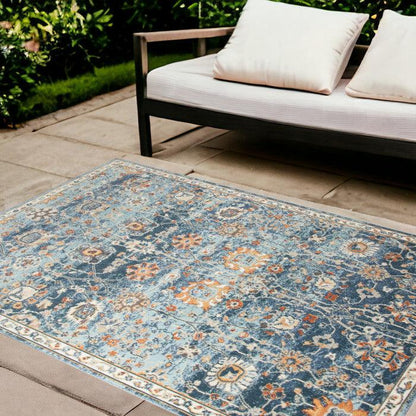 5' x 7' Blue and Orange Floral Stain Resistant Indoor Outdoor Area Rug - FurniFindUSA