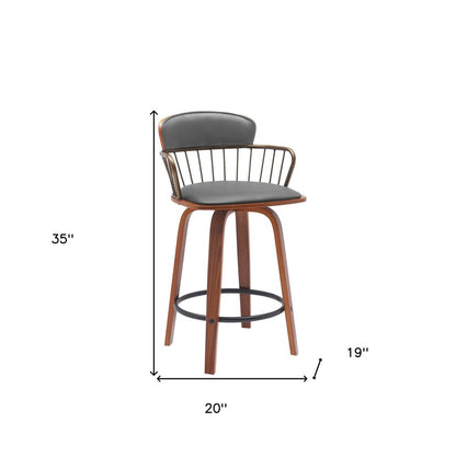 26" Gray And Brown Faux Leather And Fabric And Wood Low Back Counter Height Swivel Bar Chair HomeRoots
