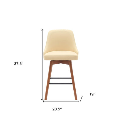 26" Cream And Brown Faux Leather And Fabric And Solid Wood Counter Height Swivel Bar Chair HomeRoots