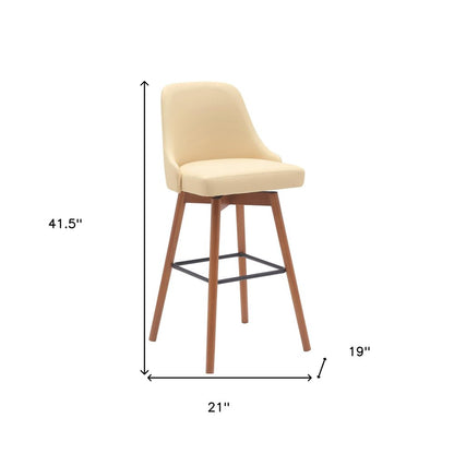 30" Cream And Brown Faux Leather And Fabric And Solid Wood Bar Height Swivel Bar Chair HomeRoots