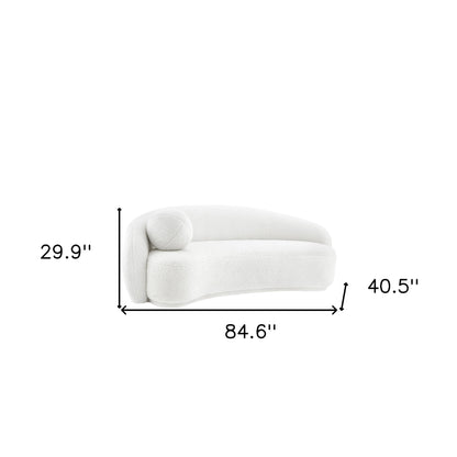 85" Cream Sherpa Curved Sofa And Toss Pillow With Legs