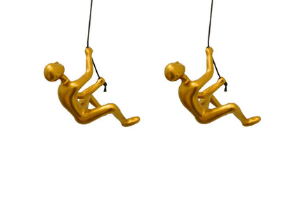 Set of Two Gold Resin Climbing Man Hanging Dimensional Sculpture