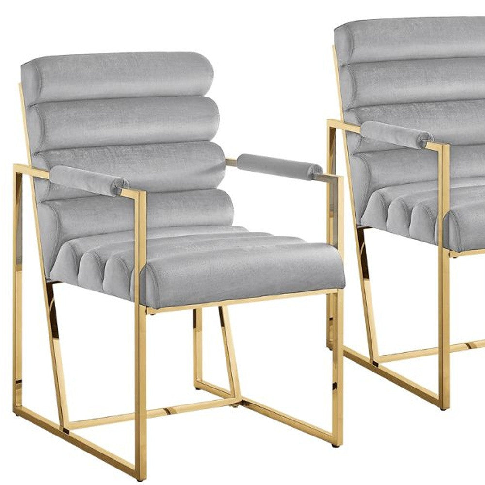 Set of Two Tufted Navy Blue And Gold Upholstered Velvet Dining Arm Chairs