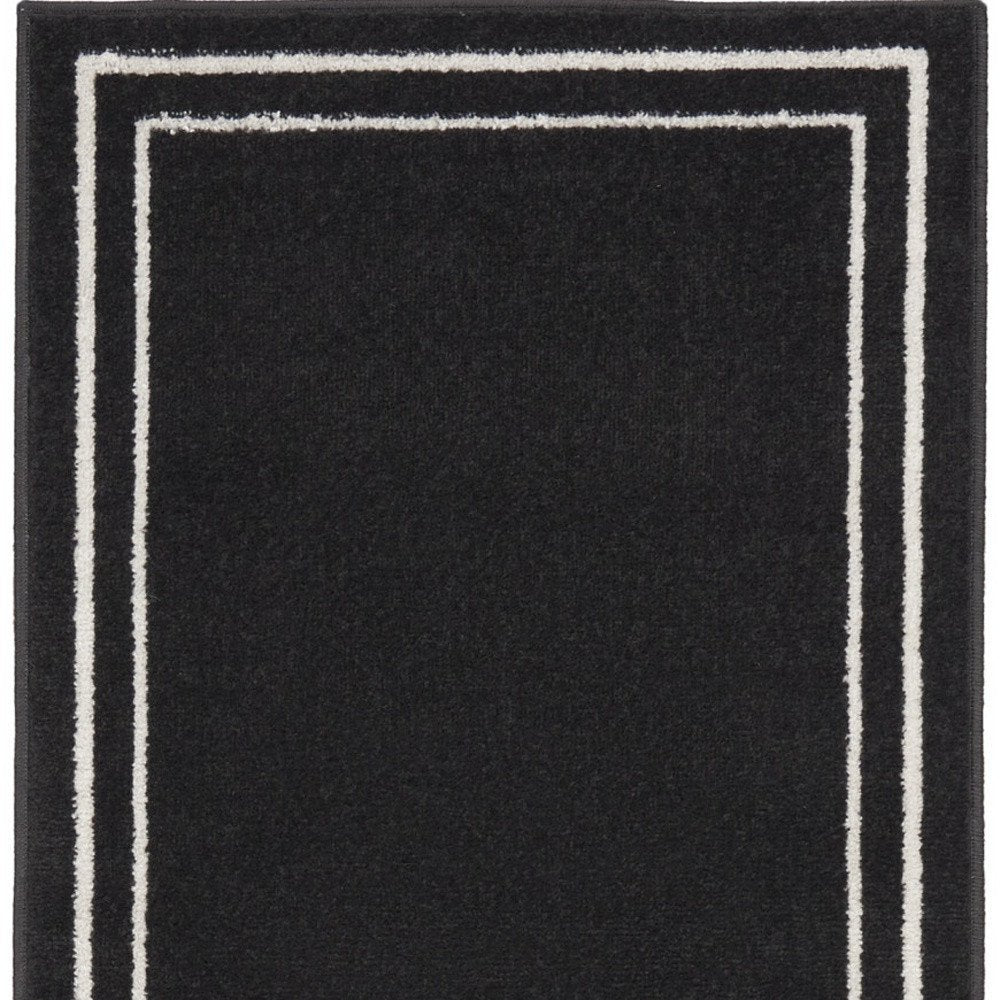 8' Black And Ivory Indoor Outdoor Runner Rug — view 2