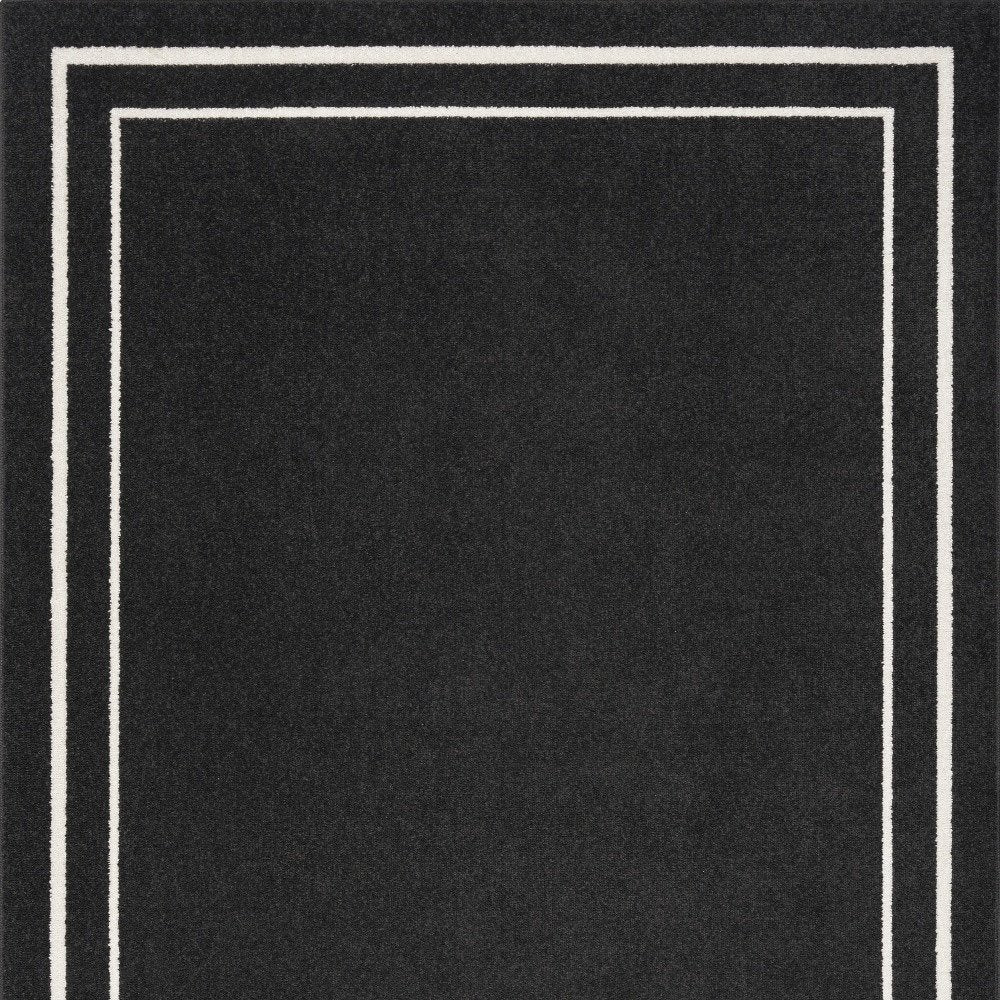 4' X 6' Black And Ivory Indoor Outdoor Area Rug — view 3