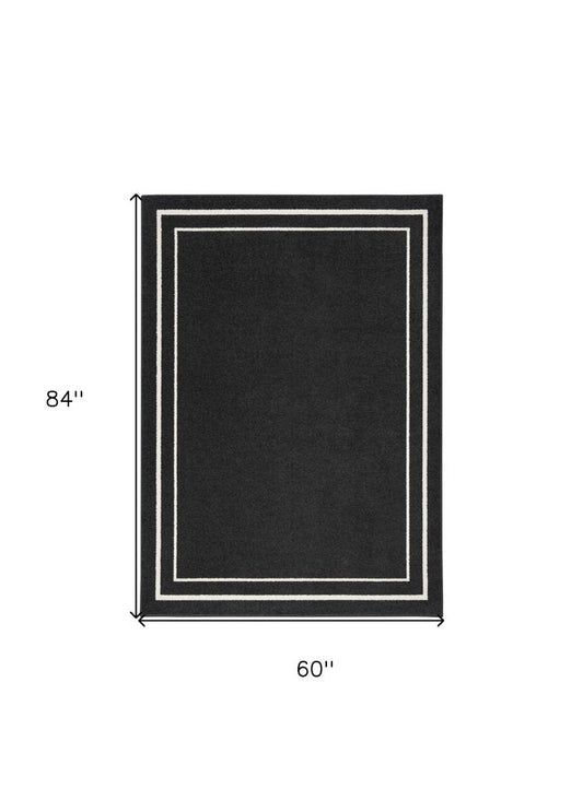 5' X 7' Black And Ivory Indoor Outdoor Area Rug