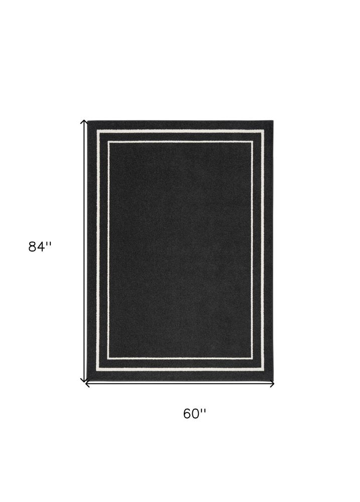 5' X 7' Black And Ivory Indoor Outdoor Area Rug HomeRoots