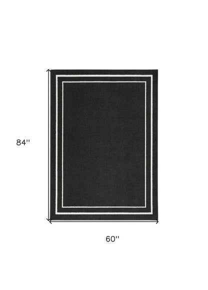 5' X 7' Black And Ivory Indoor Outdoor Area Rug HomeRoots