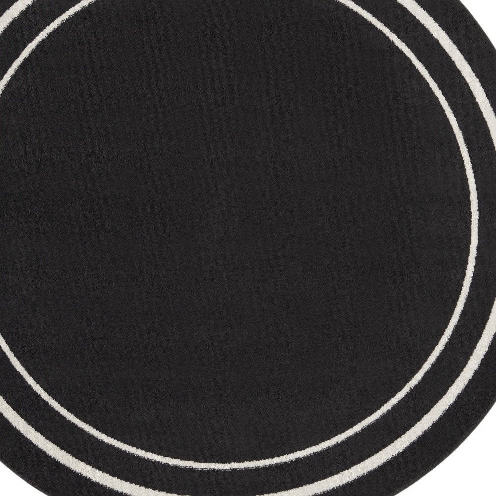 8' Black And Ivory Round Indoor Outdoor Area Rug HomeRoots