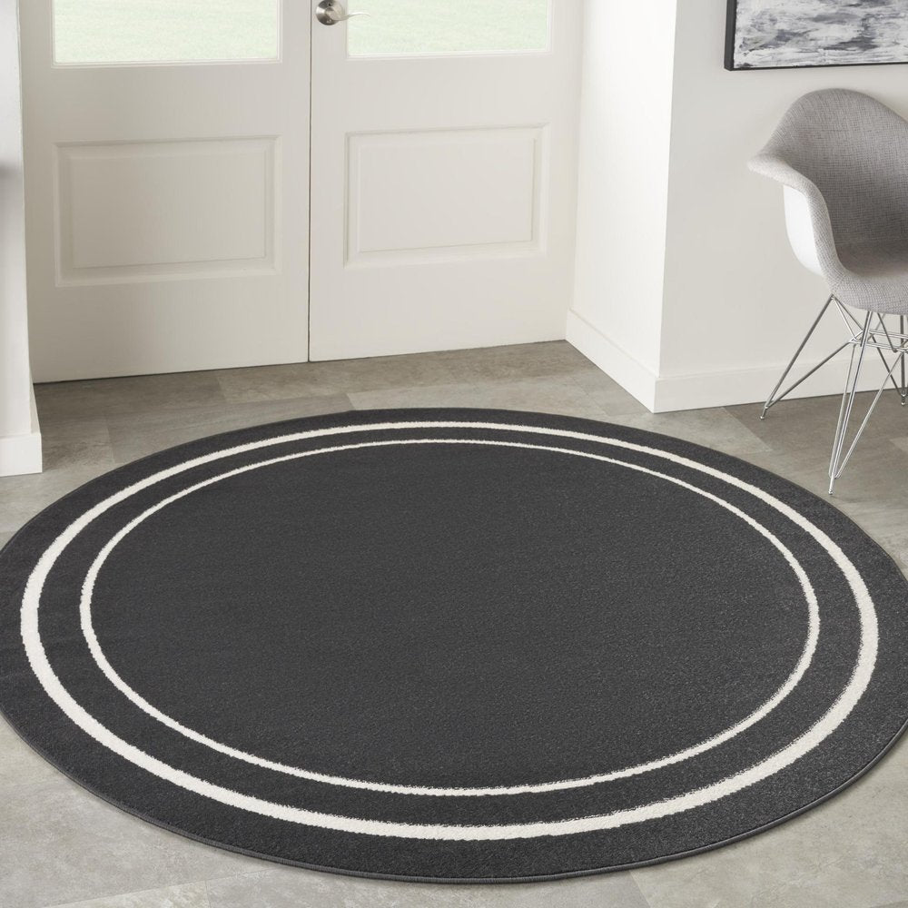 8' Black And Ivory Round Indoor Outdoor Area Rug HomeRoots