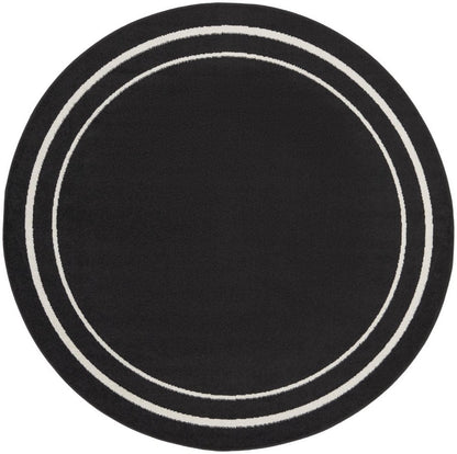 8' Black And Ivory Round Indoor Outdoor Area Rug