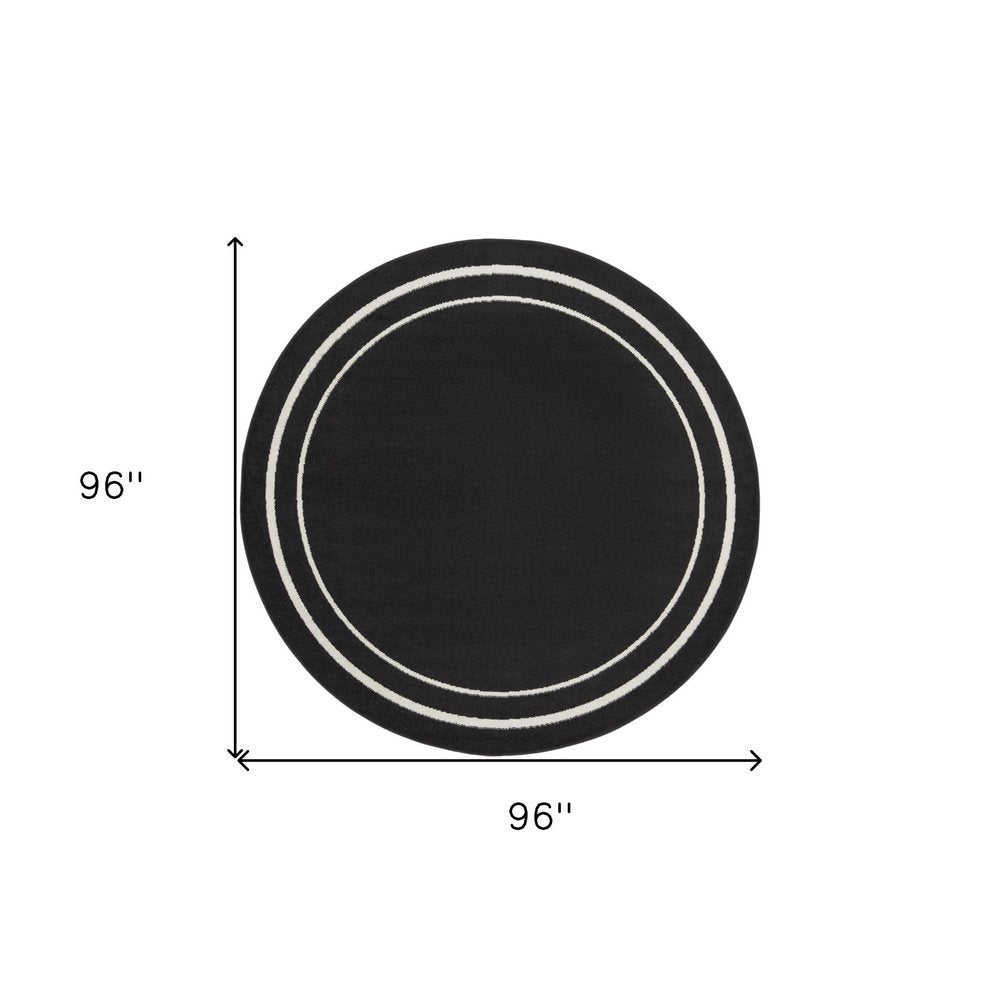 8' Black And Ivory Round Indoor Outdoor Area Rug — view 1