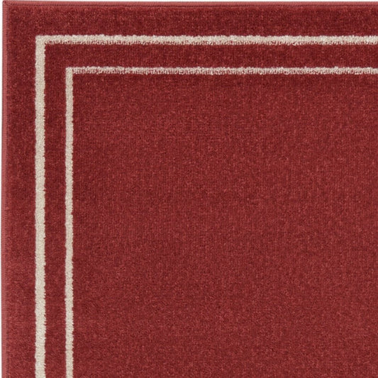 6' Brick Red And Ivory Indoor Outdoor Runner Rug