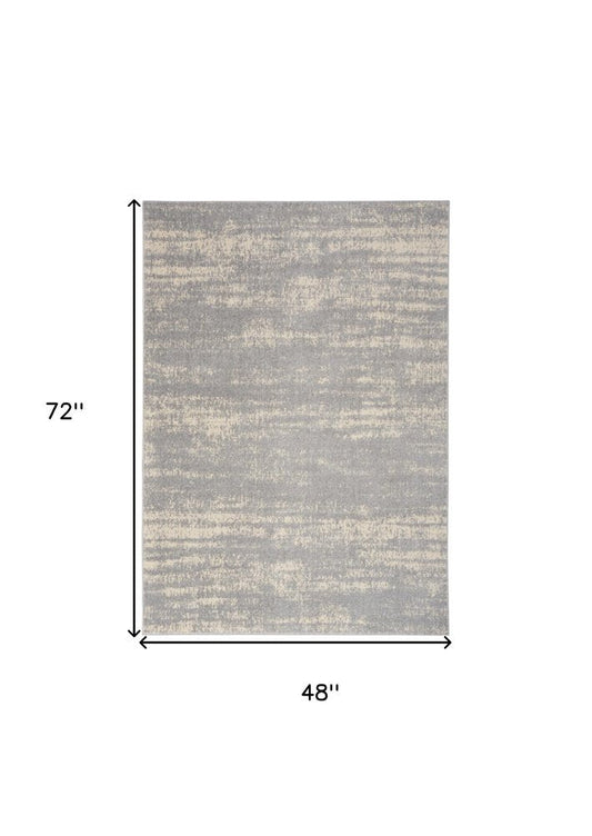 4' X 6' Gray And Beige Abstract Indoor Outdoor Area Rug