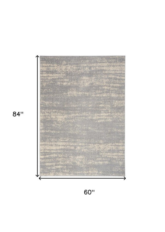 5' X 7' Gray And Beige Abstract Indoor Outdoor Area Rug