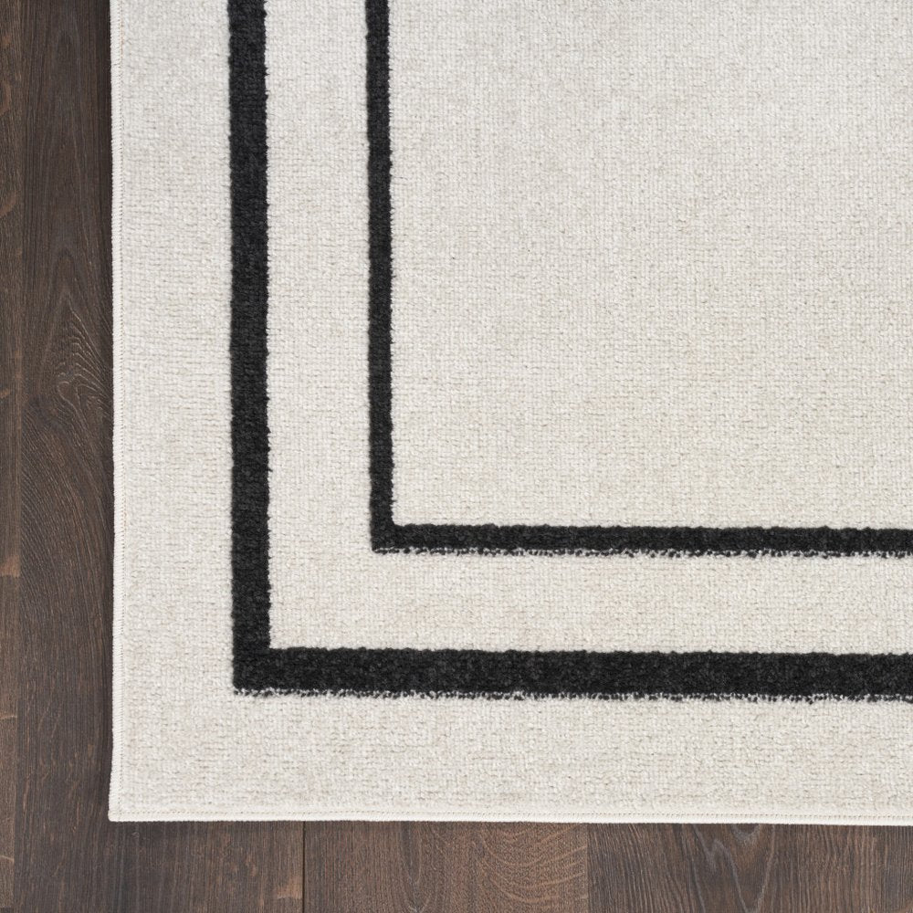 8' Ivory And Black Indoor Outdoor Runner Rug — view 7