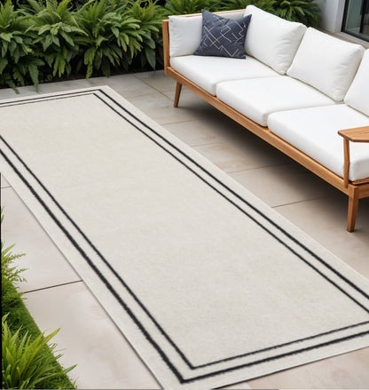8' Ivory And Black Indoor Outdoor Runner Rug HomeRoots