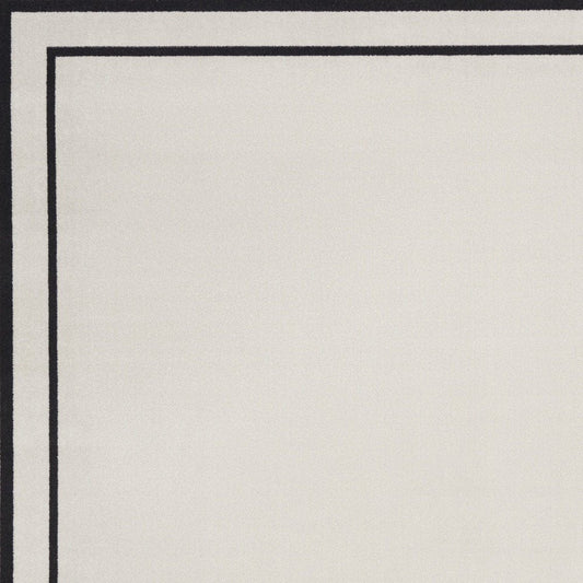 8' X 10' Ivory And Black Indoor Outdoor Area Rug