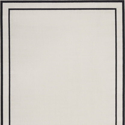 8' X 10' Ivory And Black Indoor Outdoor Area Rug