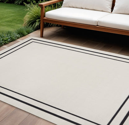 8' X 10' Ivory And Black Indoor Outdoor Area Rug HomeRoots