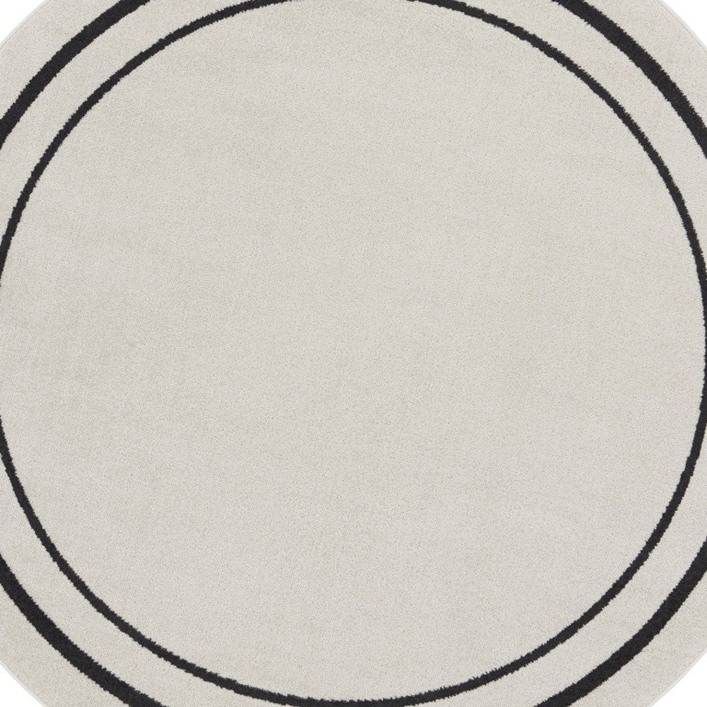 8' Ivory And Black Round Indoor Outdoor Area Rug HomeRoots