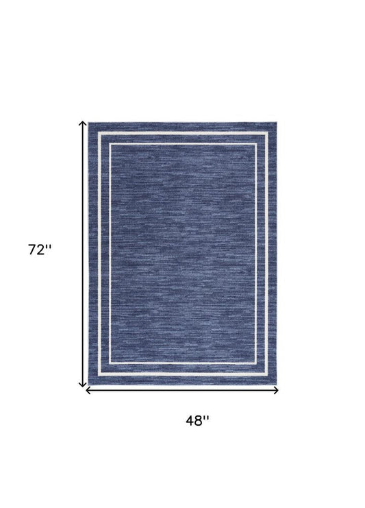 4' X 6' Navy Blue And Ivory Indoor Outdoor Area Rug