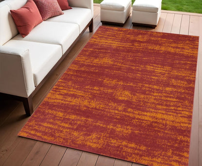 4' X 6' Red And Orange Abstract Indoor Outdoor Area Rug