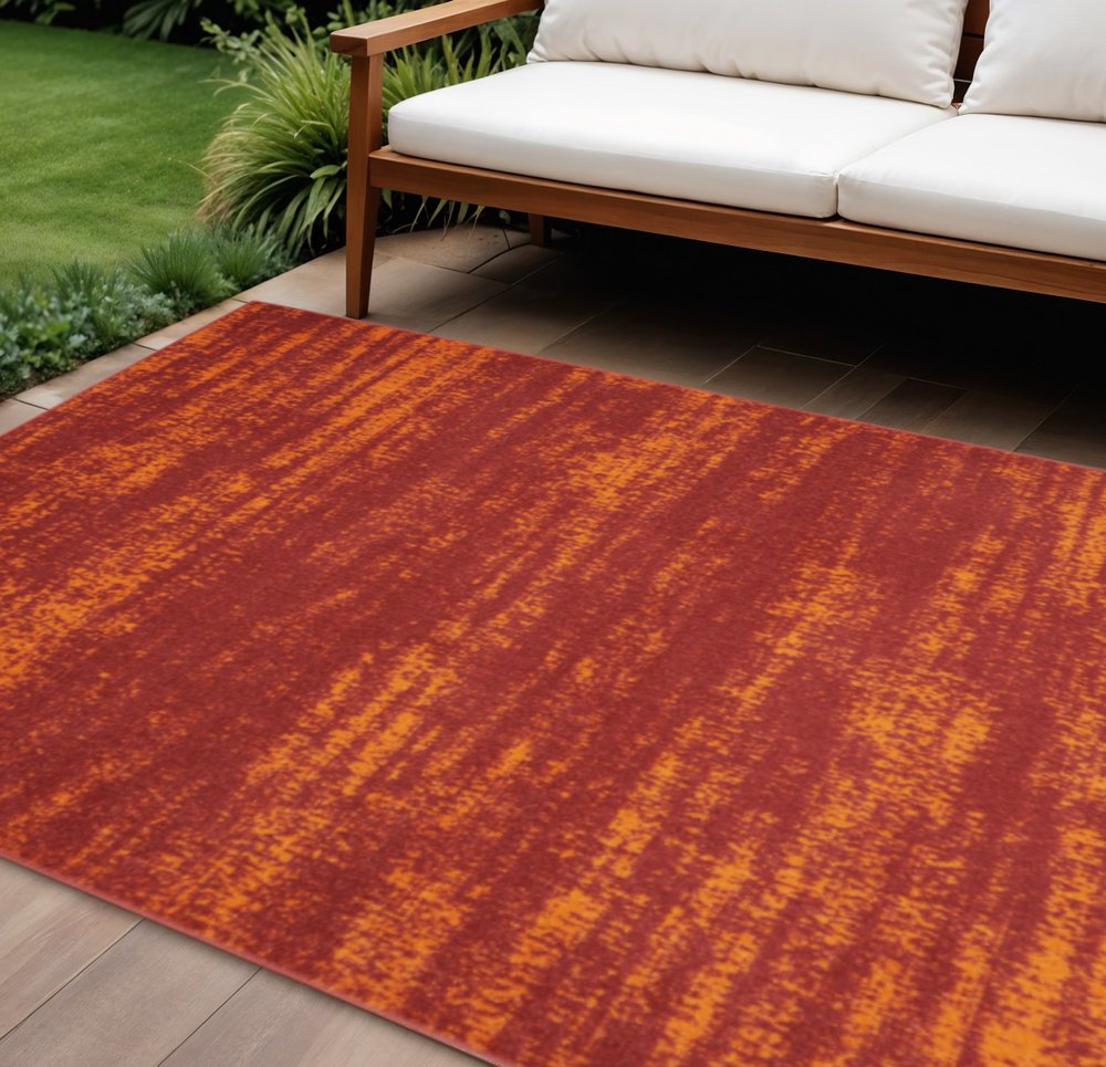 6' X 9' Red And Orange Abstract Indoor Outdoor Area Rug — view 4