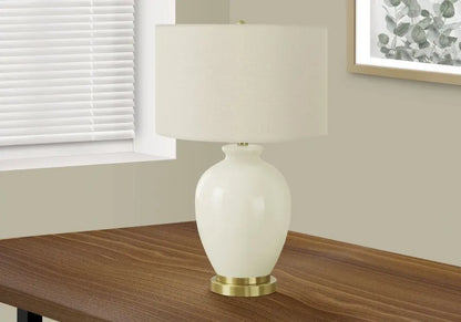 26" Gold and Ivory Ceramic Urn Table Lamp With Cream Drum Shade HomeRoots