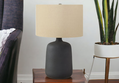 24" Black Ceramic Round Table Lamp With Beige Drum Shade