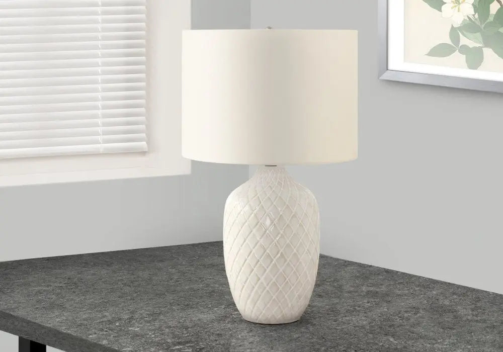 25" Cream Ceramic Urn Table Lamp With Cream Drum Shade HomeRoots