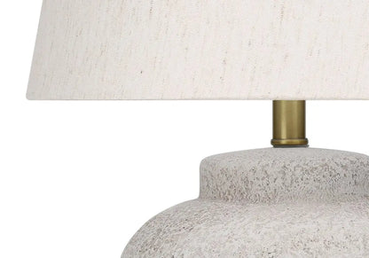 22" Cream Concrete Urn Table Lamp With Cream Abstract Empire Shade HomeRoots