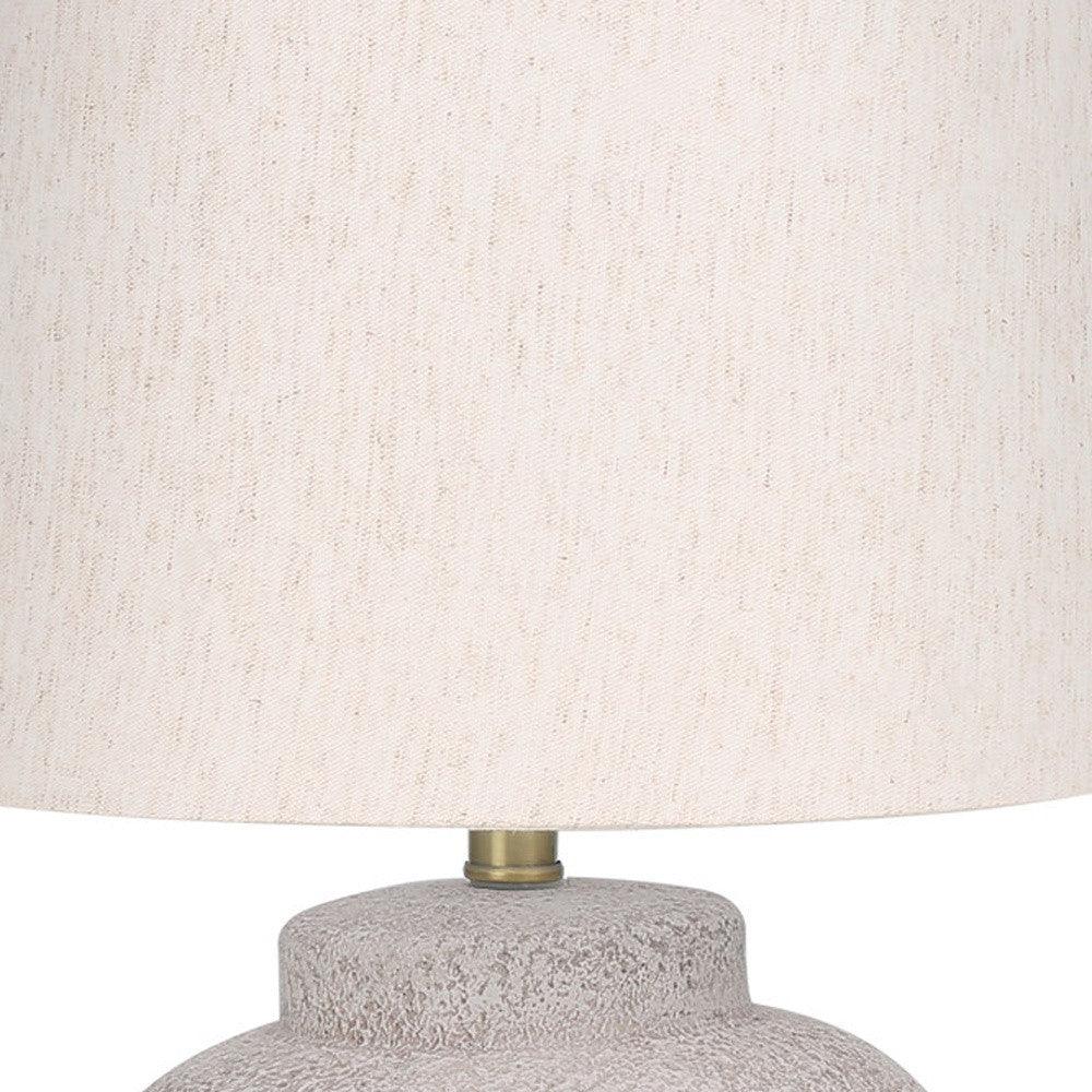 22" Cream Concrete Urn Table Lamp With Cream Abstract Empire Shade - FurniFindUSA