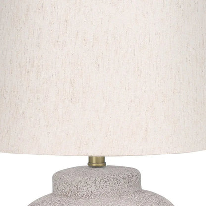22" Cream Concrete Urn Table Lamp With Cream Abstract Empire Shade HomeRoots