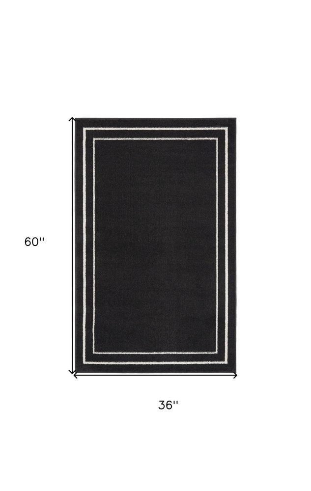 3' X 5' Black And Ivory Indoor Outdoor Area Rug — view 1