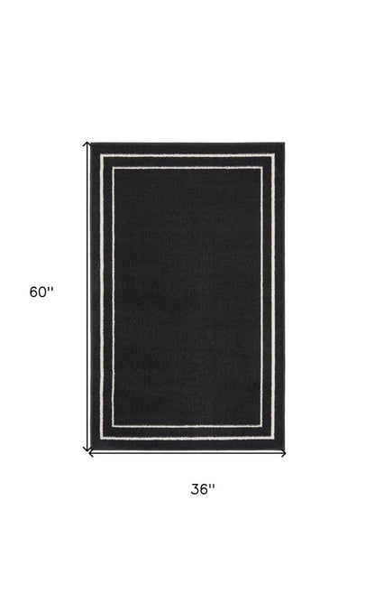 3' X 5' Black And Ivory Indoor Outdoor Area Rug HomeRoots