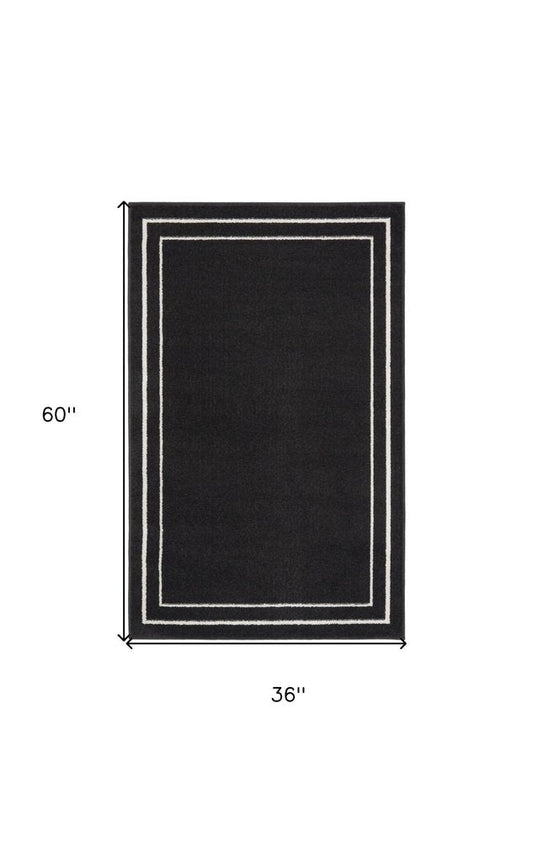 3' X 5' Black And Ivory Indoor Outdoor Area Rug