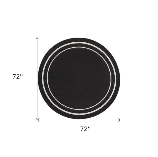 6' Black And Ivory Round Indoor Outdoor Area Rug