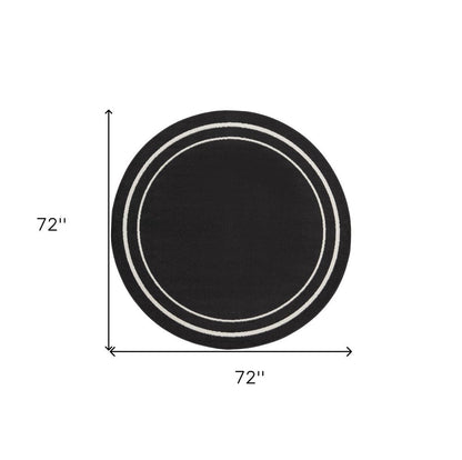 6' Black And Ivory Round Indoor Outdoor Area Rug