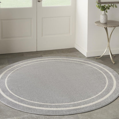 4' Gray And Ivory Round Indoor Outdoor Area Rug