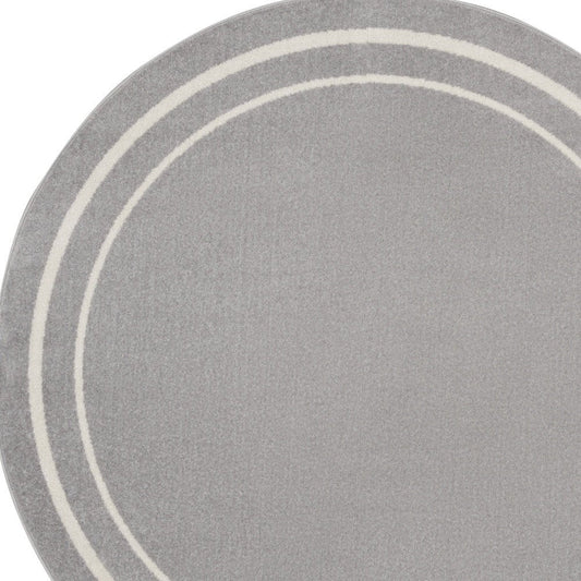 6' Gray And Ivory Round Indoor Outdoor Area Rug