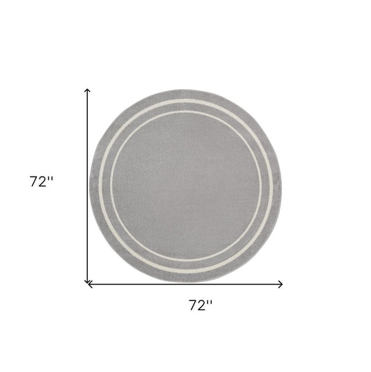 6' Gray And Ivory Round Indoor Outdoor Area Rug