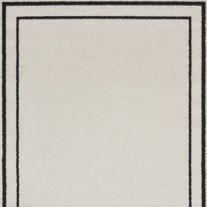 2' X 4' Ivory And Black Indoor Outdoor Area Rug HomeRoots