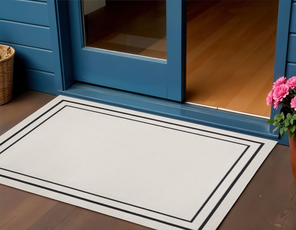2' X 4' Ivory And Black Indoor Outdoor Area Rug — view 4